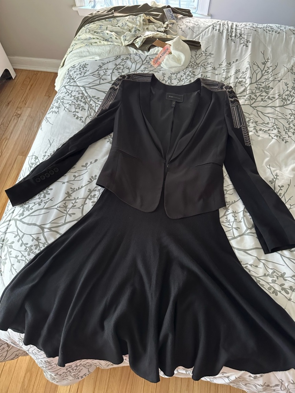 BCBGMaxAzria Black short jacket with Embellished Shoulders and glared skirt set